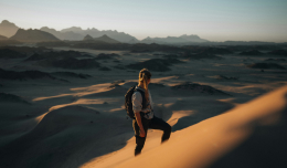 Image of a man standing in the desert