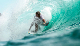 an image of a surfing man